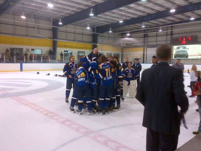WhitbyThanksgivingChamps1_2014_Raising_up_the_Cup.JPG